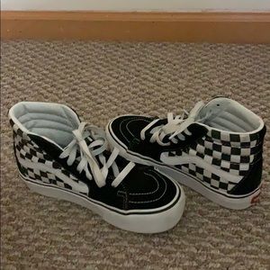 Checkered high top vans